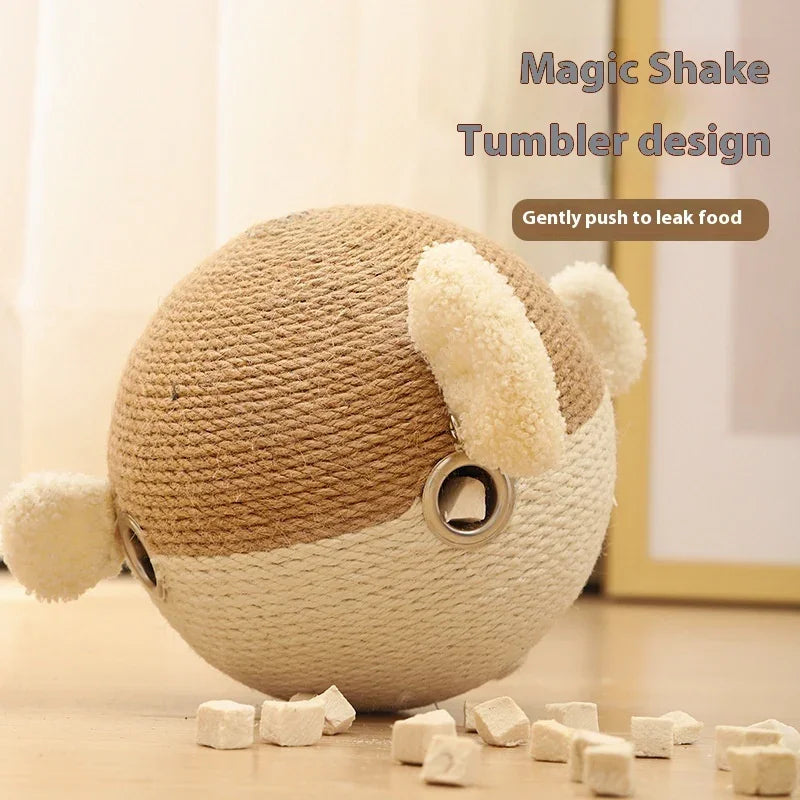 Interactive tumbler pet toy ball with food dispenser, beige and white rope, on wooden floor