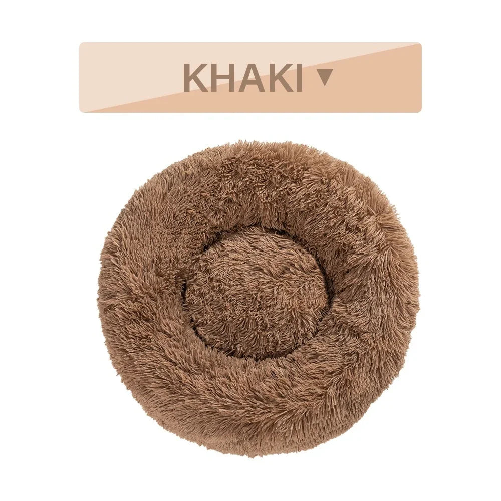 Khaki round plush pet bed with soft, fluffy texture for cats or small dogs.