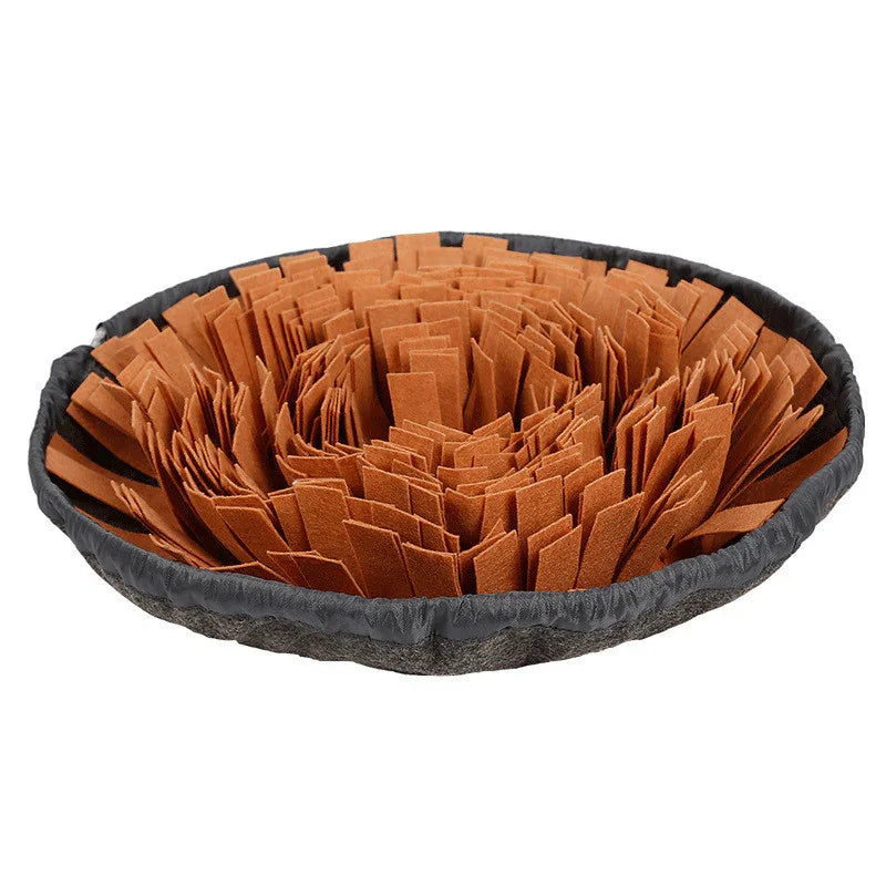 Brown round snuffle mat for pets with layered fabric strips in a black fabric base