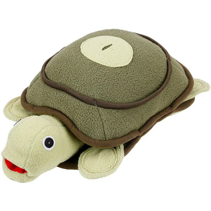 plush turtle toy with green shell and red mouth on white background