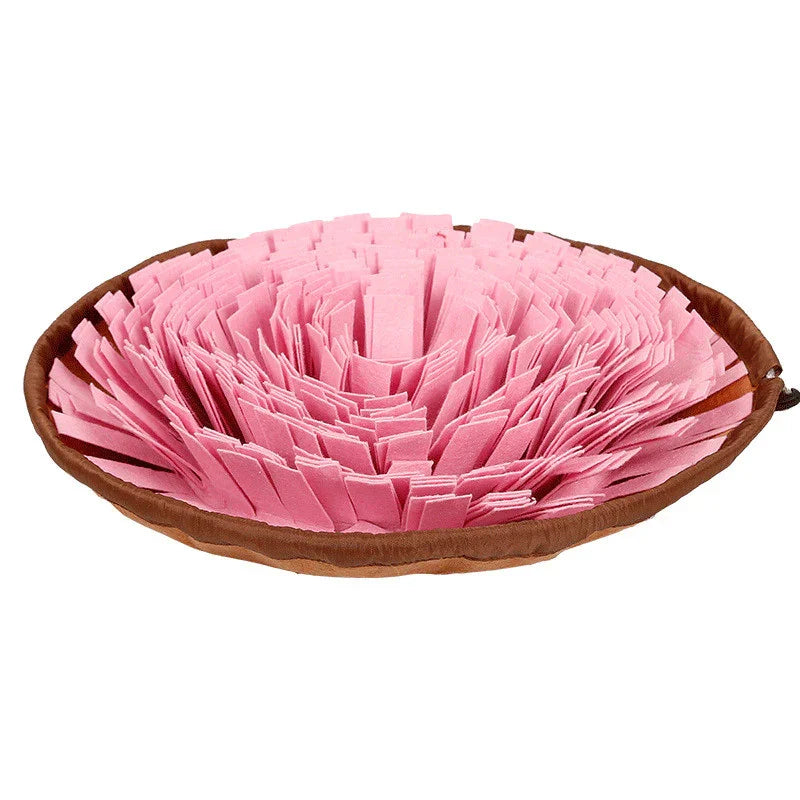 Round pink snuffle mat for dogs with brown edge, pet enrichment feeding toy